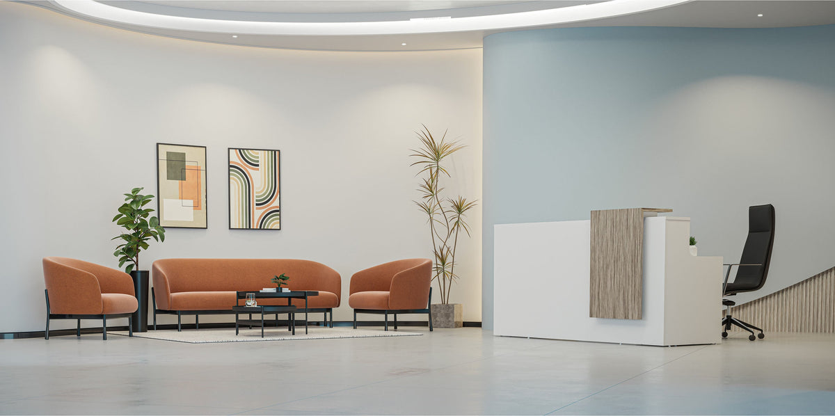 Reception counter and lounge seating in a furnished reception area