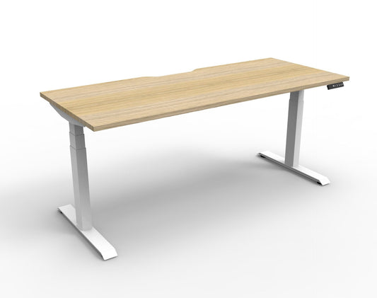 Boost+ electric single desk, Natural Oak / White Satin, without screen or cable tray. Representative image; proportions vary by size.