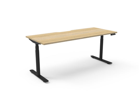 Halo+ electric single desk, Natural Oak / Black Satin, without screen or cable tray. Representative image; proportions vary by size.